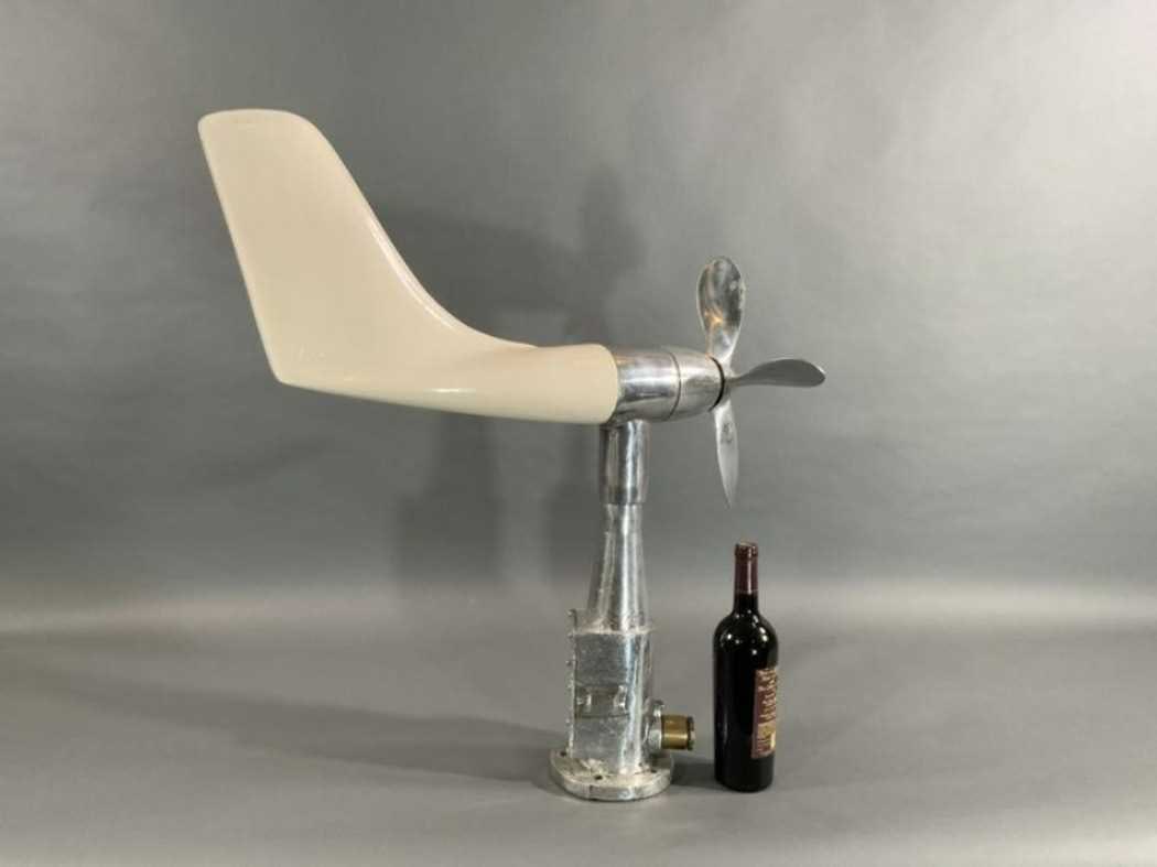 Aluminum Ships Anemometer: Pedestal mounted ships anemometer, with vane and propeller. Polished aluminum with fiberglass vane. Made by Herivana Tech Co LTD. Weight is 17 pounds. 31" H x 25" L. Circa 1960.
