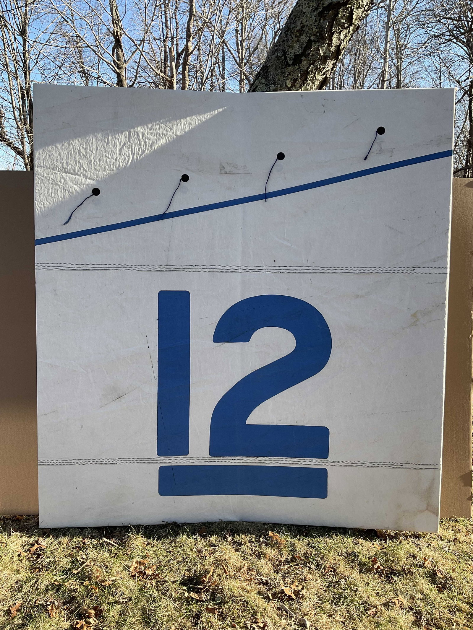 America’s Cup Yacht Intrepid Sail Section: 12 Meter America’s cup yacht Intrepid sail section mounted to two doors hinged together. This rare yachting relic has the large 12 from the sail. Intrepid was designed by Olin Stephens and won t
