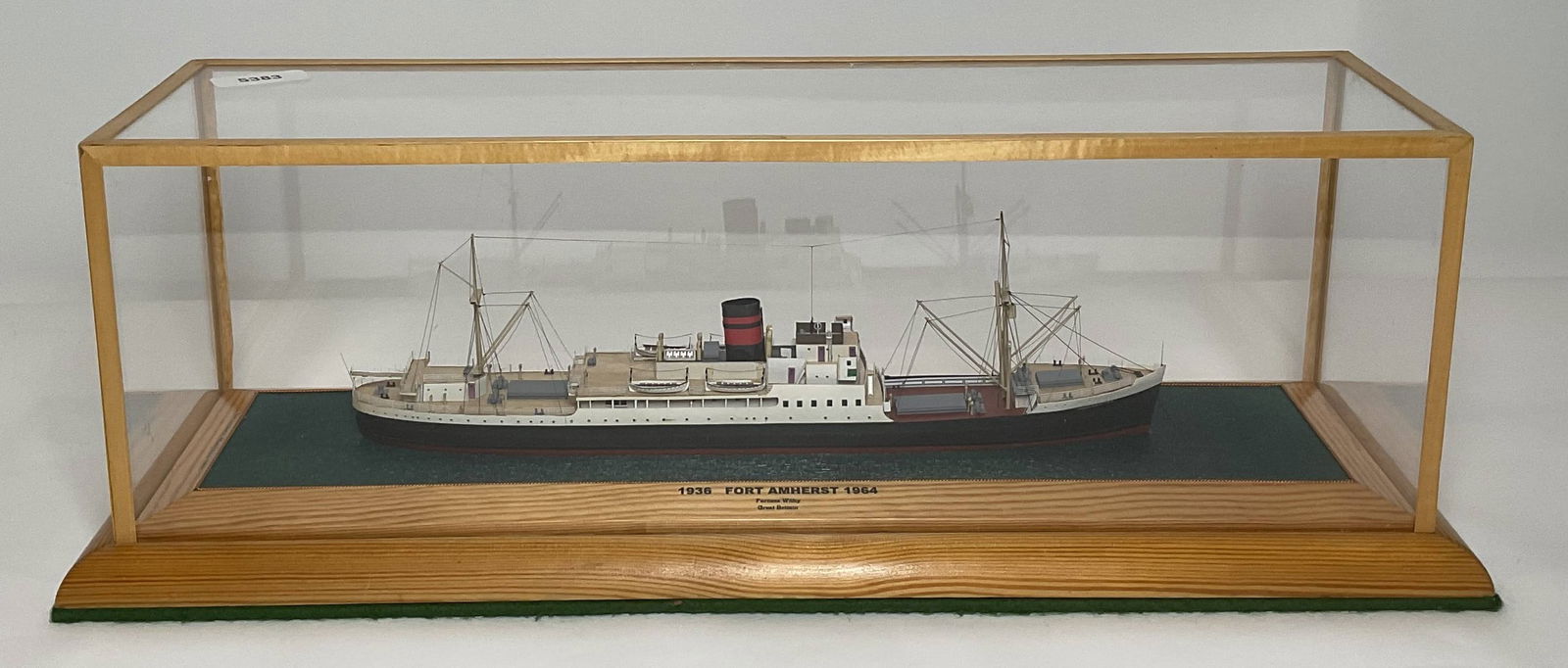 Furness Lines Ship Fort Amherst: Fort Amherst was built in 1936 and modeled by the renowned Robert Wilson in 1964. The cased model is 7' wide x 7" high high x 21" long and is built of primarily of wood and card. The ship was part of