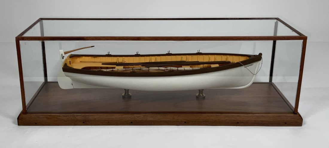 Ships Longboat Model by William Hitchcock: Finely executed planked longboat by William Hitchcock, circa 1968. Very well executed including keel benches with brackets, oars, floorboards keel, mast, sail, rudder with tiller, rope coils, etc.. Fi