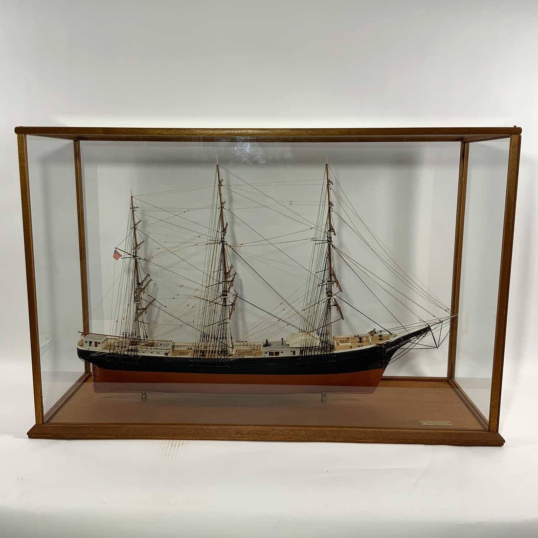 Wood Cased Ship Model Of The Benjamin F. Packard o: Very well executed model of the both Maine Built Clipper Ship Benjamin Packard. A 244 foot square rigged sailing ship launched at the shipyard of Goss, Sawyer and Packard in Bath, Maine. She is named
