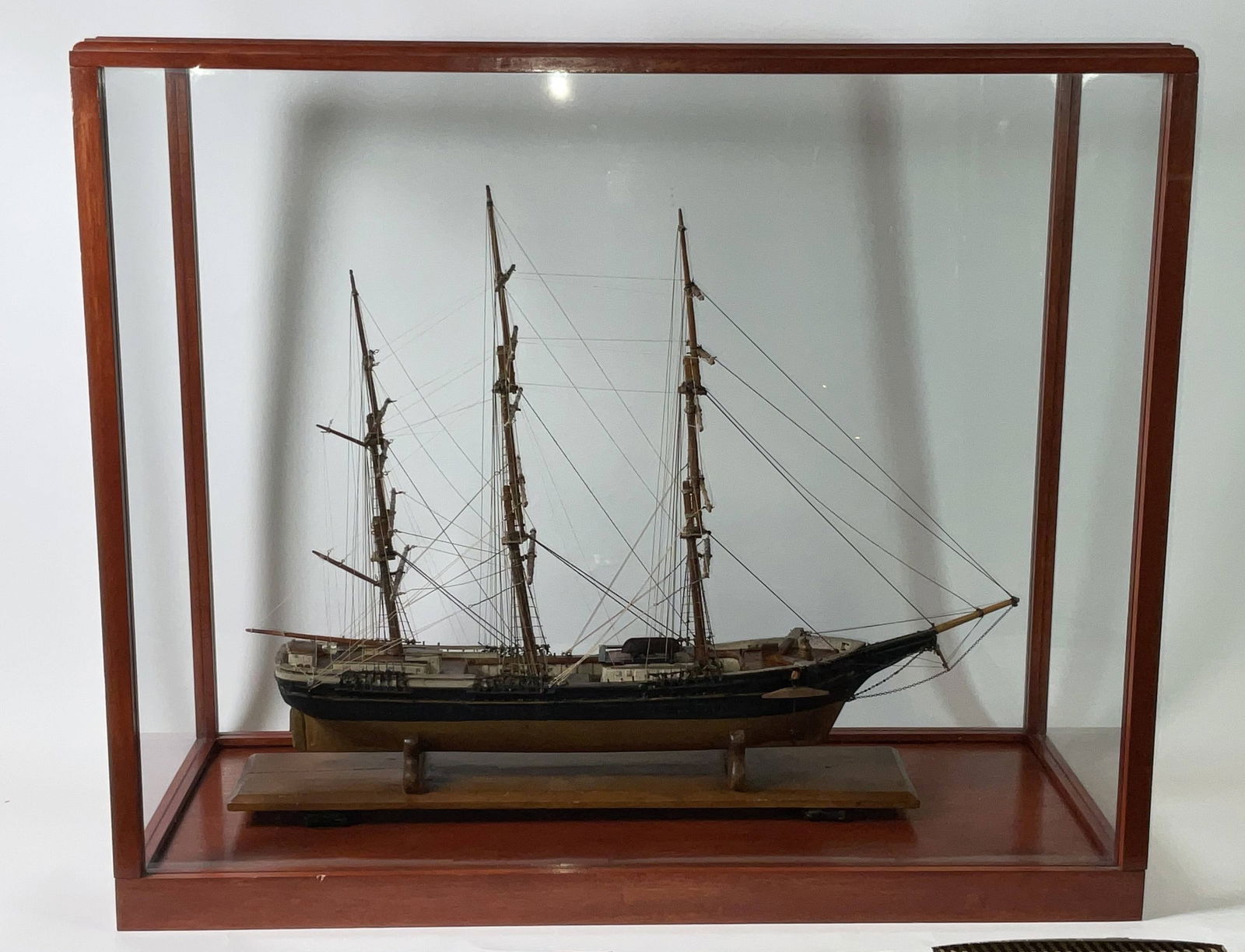 American Clipper Ship Model in Case: Ship model of the "White Cloud" of Boston. Scribed deck with hatches, cabins, pump, capstan, etc. with glass case 25"H x 12"W x 30"D 27 lbs.