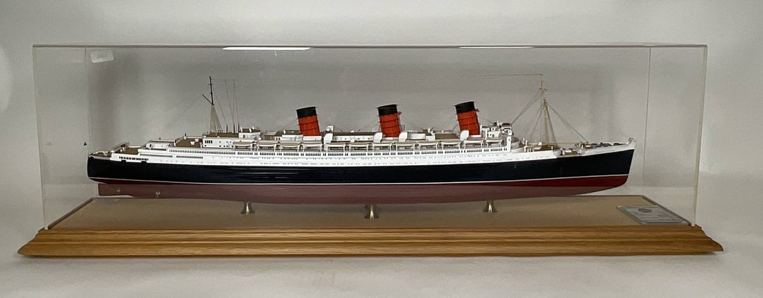 RMS Queen Mary Ship Model by Berti and Lewis: This spectacular full hull model of the RMS Queen Mary was built by Berti & Lewis and has extraordinary detail and quality. The Queen does not require much description. She was launched in 1936, winni
