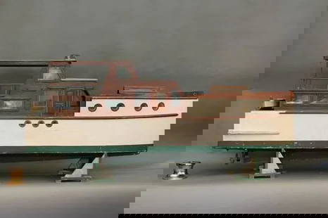 Six-Foot Folk Art Model of A Pleasure Yacht: Funky cabin cruiser yacht of a very large scale. Green and white hull with large portholes. Glass windows and skylight. Mahogany cabins. Nameboard reads "Mazie". Some interior detail. Lifeboat. Dimens