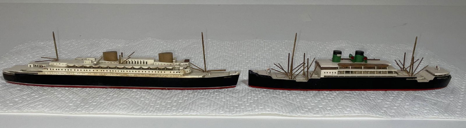 Van Ryper Ship Models of Bremen and Kungsholm: Two ocean liners, the Kungsholm, a Swedish-American Line ship launched in 1928, and the Bremen, a German ocean liner built for the Norddeutscher Lloyd Line. Both are marked "Van Ryper, Vineyard Haven,