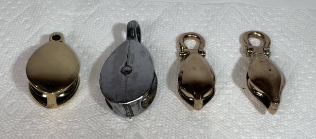 Group of Four Brass Yacht Pulley Blocks