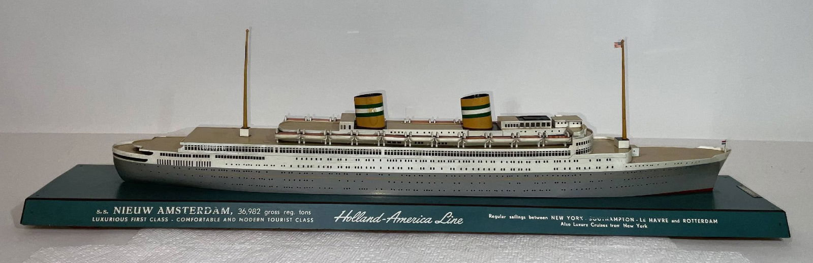 Ocean Liner SS Nieuw Amsterdam Model from Holland America Line: Professionally built waterline model of the Holland America Line steamship "S.S. Nieuw Amsterdam." With builder plate from model maker C. Dubbelman, Slikkerveer, Holland. The painting on the base read