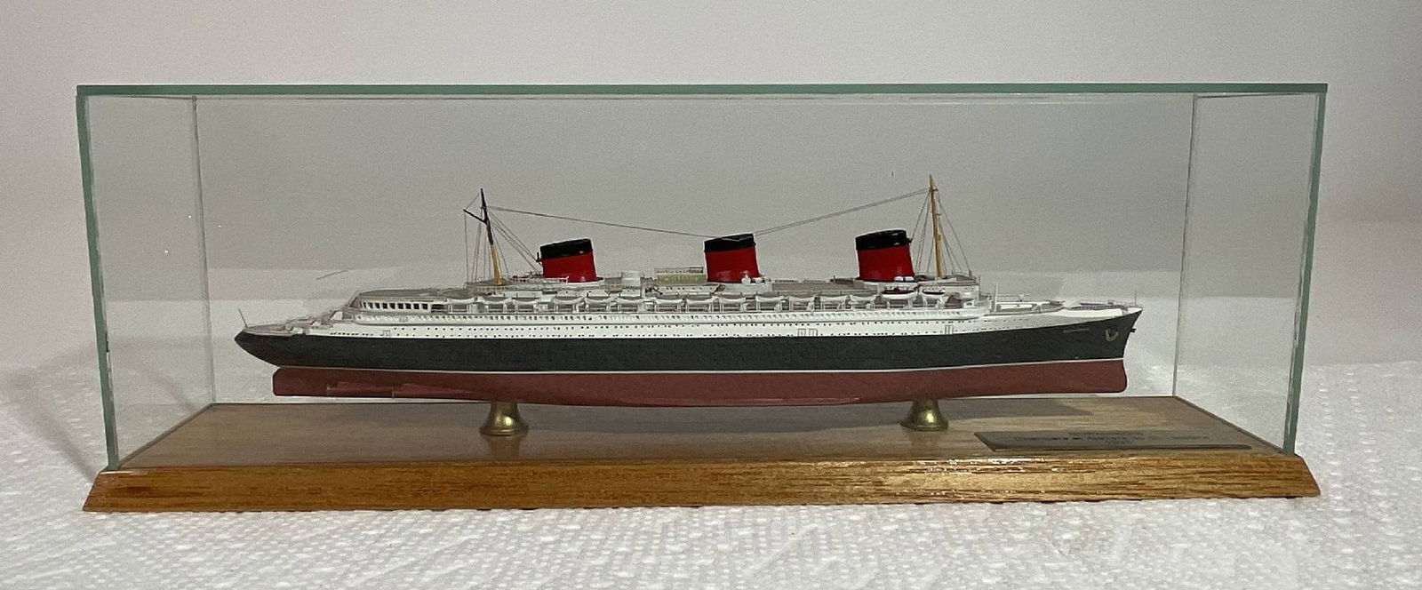 Rare CSC 1:1250 Full Hull Normandie Model ? Pristine in Original Box & Case: CSC makes absolutely exquisite miniatures sought by collectors worldwide. This 1" - 1250" full hull version of the Normandie is long out of production and extremely rare. Normandie was launched in 193
