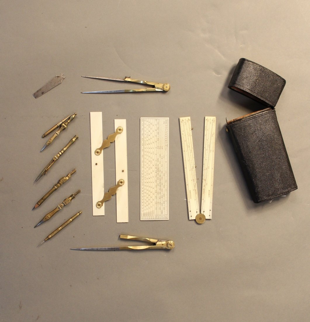 Shagreen-cased drafting set by Dolland, London: Shagreen-cased drafting set by Dolland, London England 19th century, with brass and steel instruments, bone and brass parallel rule, folding bone rule marked Dolland London, protractor all in a wood a