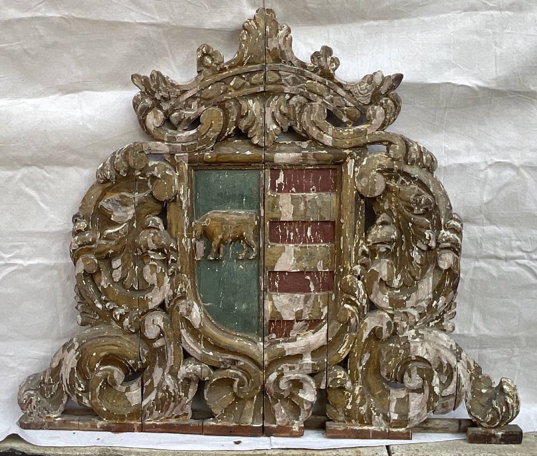 Hand Carved English family Crest: Nineteenth century carved English coat of arms. Sign unidentified. Intricately carved. Distressed condition. 33 lbs. 40" H ? 48" W.