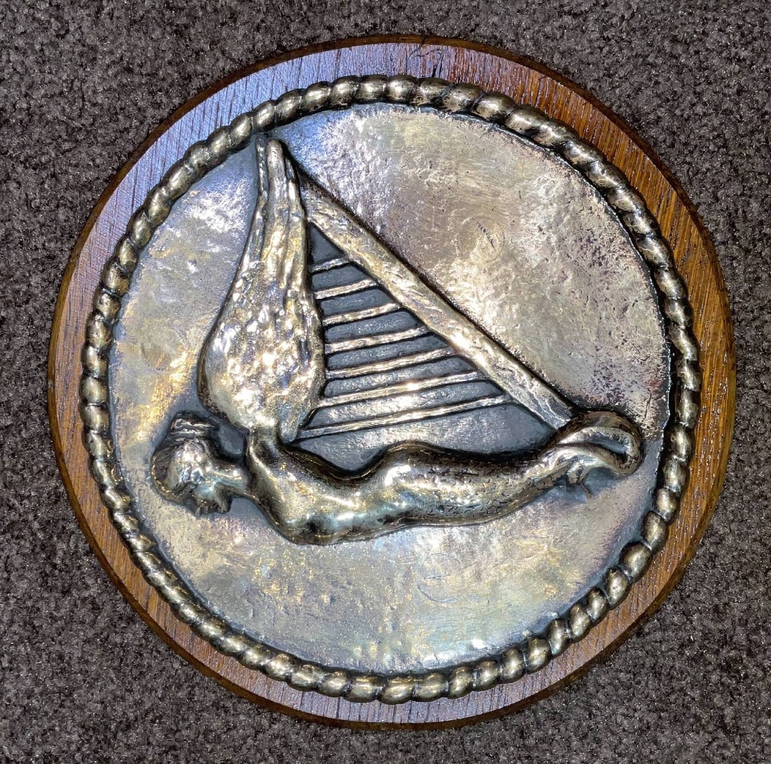 Gun Tampion from the Royal Navy Battleship HMS Erin of 1913: World War I gun tampion from HMS Erin, a dreadnought battleship of the Royal Navy, 559 feet, launched in 1913. Fine relic showing wear. Mounted to a later wood backboard. 4 lbs. 10" Diameter.