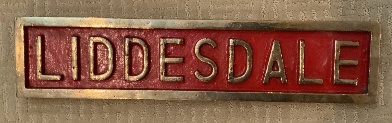 Ship's Name Placque from Hunt-Class Destroyer H.M.S. Liddesdale: Heavy polished and lacquered name placque from the Hunt-class destroyer H.M.S. Liddesdale. Built by Vickers-Armstrong and launched in August 1940. She served as a convoy escort in the Mediterranean Se