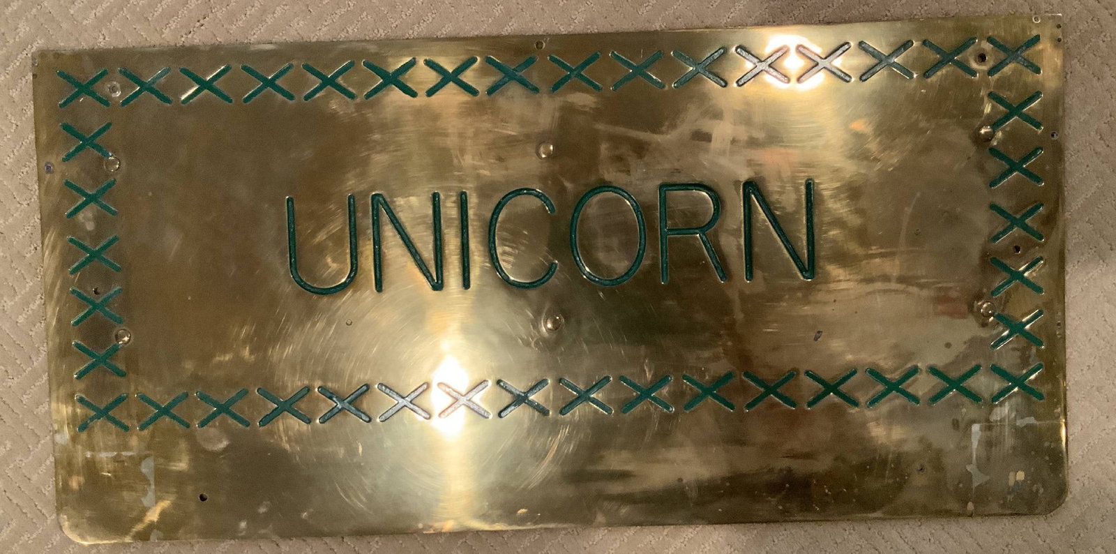 Ship's Treadplate from H.M.S. Unicorn of the Royal Navy: Ship's treadplate from H.M.S. Unicorn, an aircraft repair ship and light aircraft carrier built for the Royal Navy in the 1930s. She served in Salerno, Italy; the Indian Ocean; the British Pacific Fle