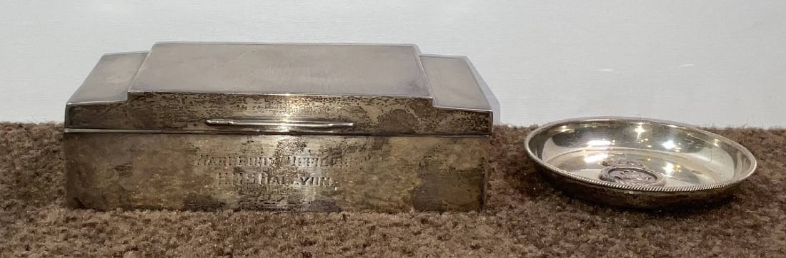 Sterling Box From the Wardroom on HMS Halcyon and Ark Royal Coaster: Sterling silver wood lined cigarette box with worn engraving "WARDROOM OFFICERS - HMS HALCYON". With hinged lid. Hallmarks include a crowned leopard signifying the city of London, The Sterling Lion Pa