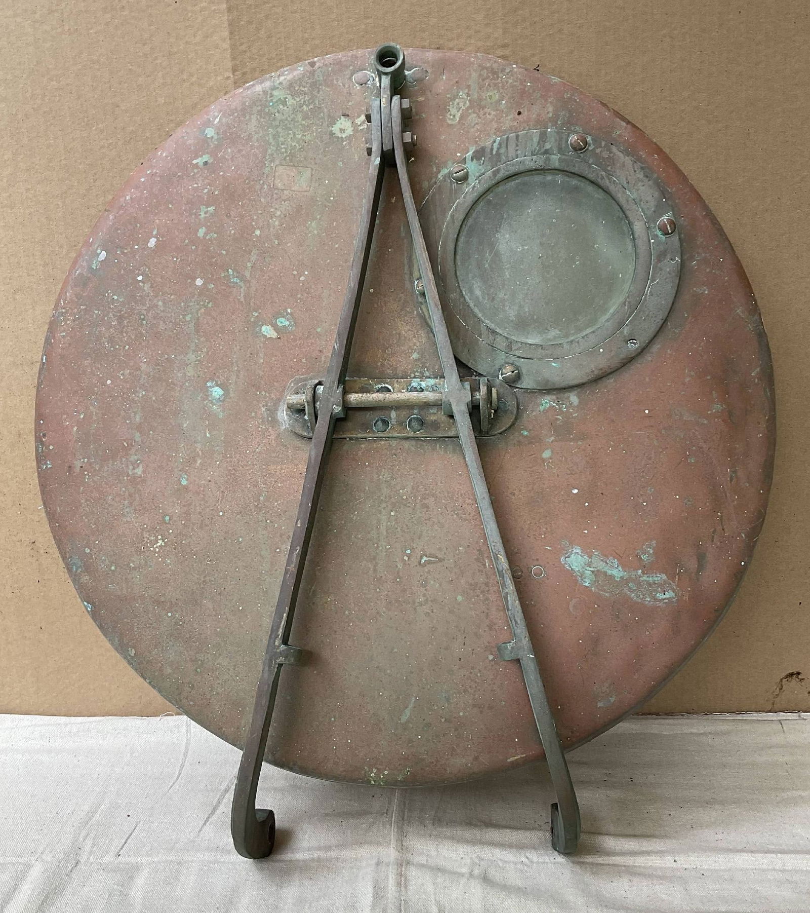 Brass and Copper Hatchcover on Hinge with Viewing Port: Solid copper ship's deck hatch on hinge with smaller viewing port with glass. 33 lbs. 26" Diameter.