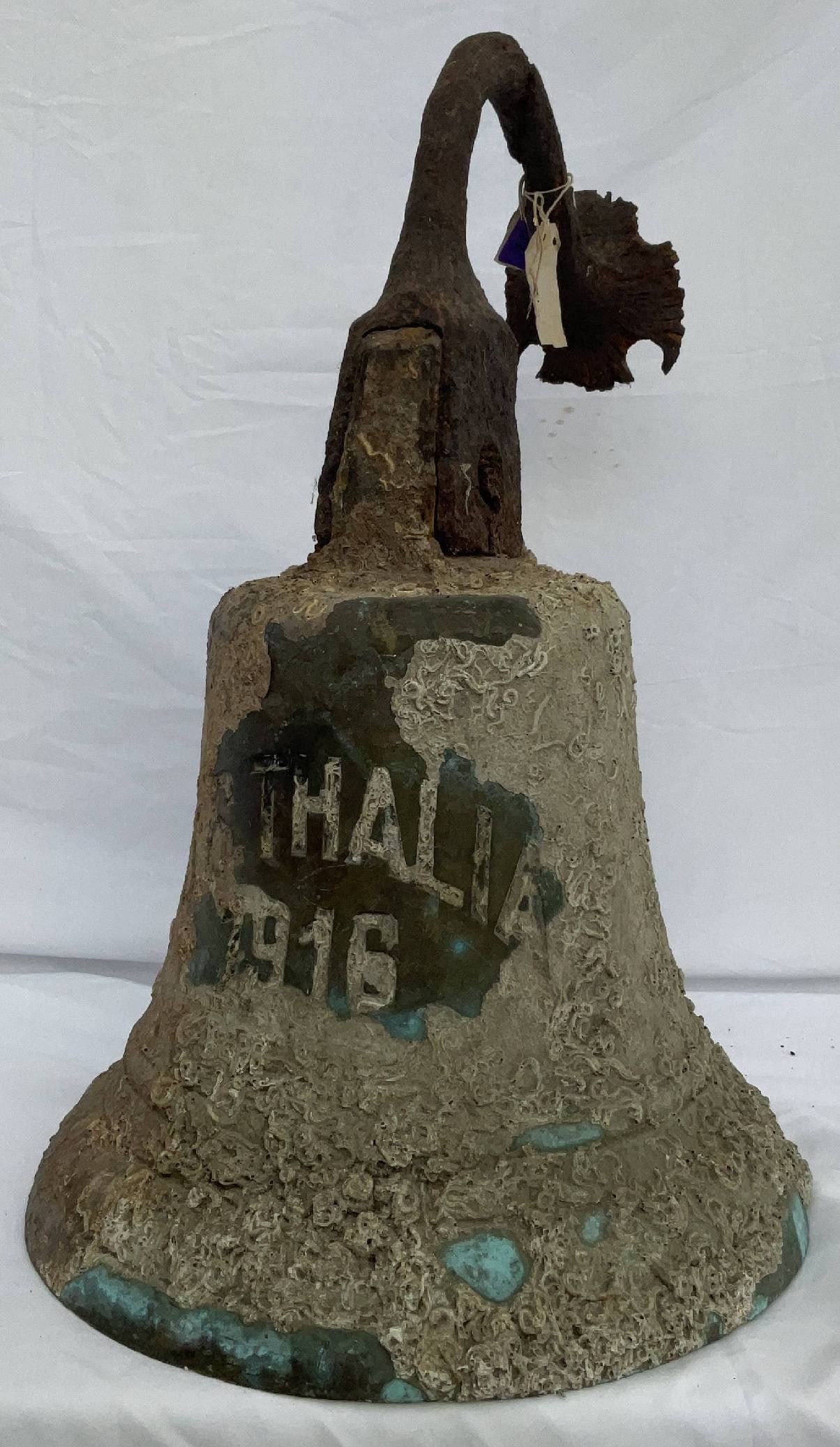 Shipwreck Ship's Bell from SS Thalia 1916: Shipwreck claimed ship's bell from the wreck of SS Thalia of 1916. Barnacles included. Great look. SS Thalia was a British steamship built in 1916, employed in merchant service during the First World 