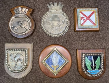 Group of Five Ship's Badges and Gun Tampions from British Warships