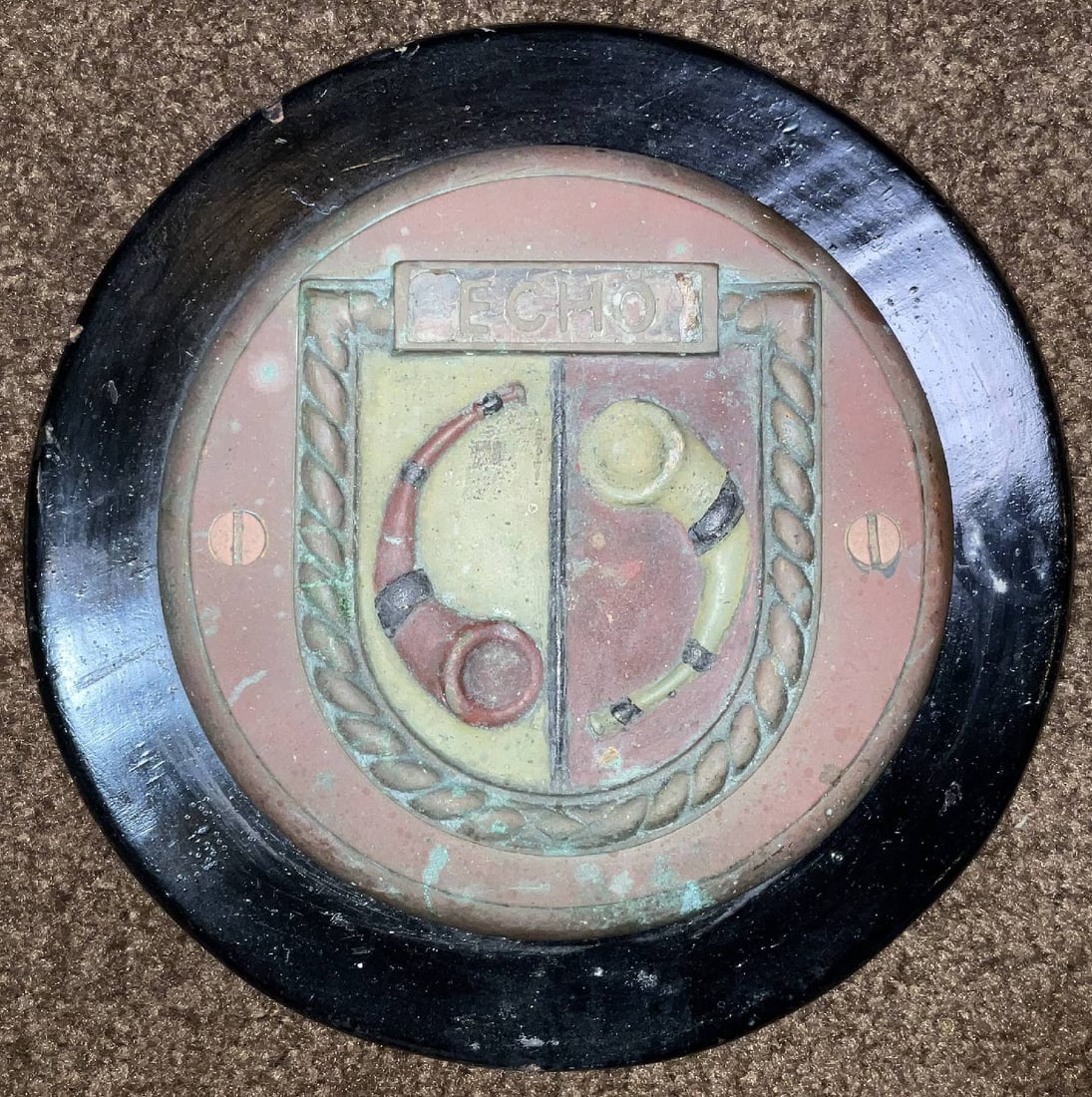 Gun Tampion from the Royal Navy Warship HMS Echo: British Royal Navy gun tampion from HMS Echo, an E-class destroyer launched in 1934. Battle honors include Atlantic 1939, Norway 1940, Bismarck action 1941, Malta, Sicily 1943, Salerno 1943, Aegean 19
