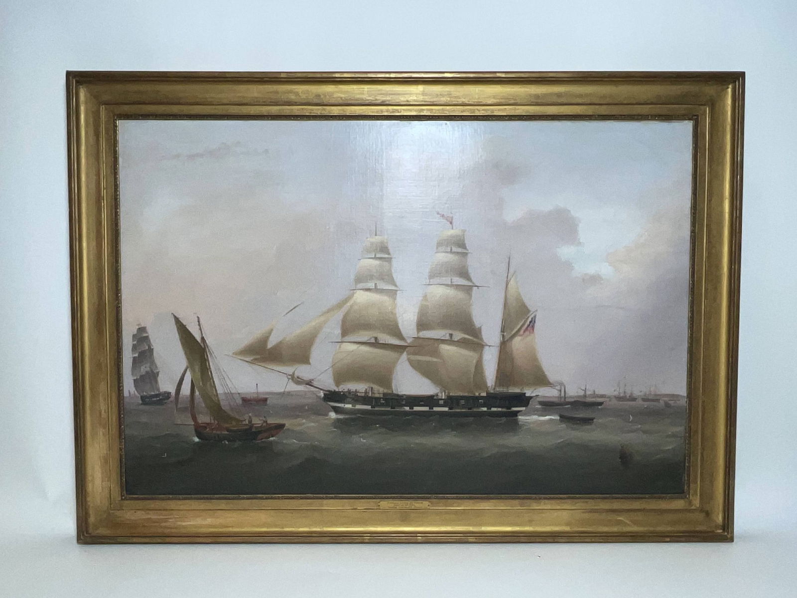 Oil Painting of a Barque Under Full Sail on Thames: Painting titled "A Barque leaving the Thames, passing the nore by Robert Strickland Thomas." with a barque flying the C&S merchants house flag. Exhibition labels on rear from London, there are several