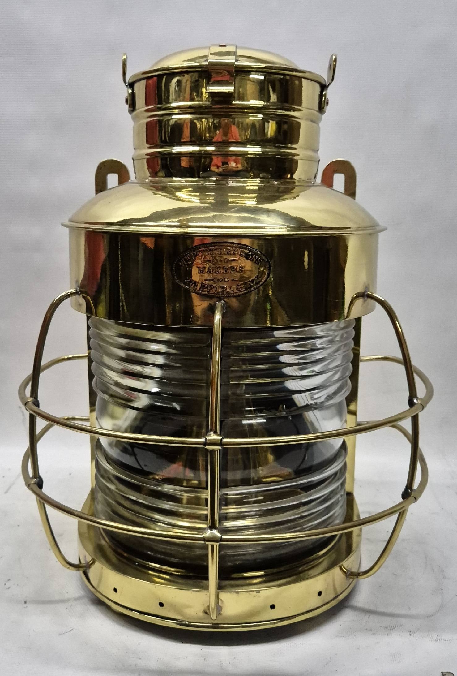 Fantastic Solid Brass Ship's Masthead Lantern: Ship's masthead lantern with maker's badge from William Porter & Sons, 27 Pearl St. New York. This is near South Street Seaport. With Fresnel glass lens, brass bars, vented top, etc. With oil burner a