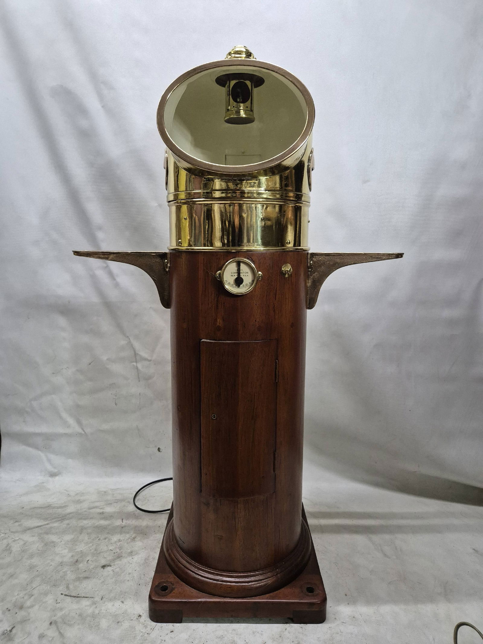 Kelvin Hughes Liberty Ship Binnacle with Compass: Ship's binnacle with varnished teak wood base with solid brass hood and compass ring. The entire compass and gimbal is also polished and lacquered. Iron compensating balls are painted black. A clinome