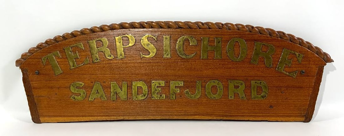 Carved Wood Sternboard From Captain's Gig On "Terpsichore": Captain's gig sternboard hardwood with rope carved border and brass lettering "Terpsichore Sandefjord" Norway. Great old sternboard from the Captain's gig from the Terpsichore. Circa 1856. 11"H x 36"L