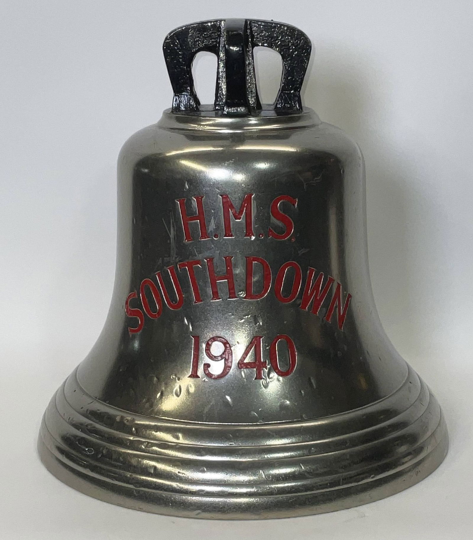 Bell from H.M.S. Southdown, 1940: Solid brass bell from the ship H.M.S. Southdown, engraved “H.M.S. Southdown 1940" fitted with a four canon crown mount cast into the bell. H.M.S. Southdown was a Type I Hunt-class escort destroyer