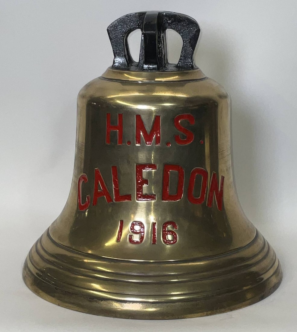 Bell from H.M.S. Caledon, 1916: Solid brass bell from the ship H.M.S. Caledon, engraved “H.M.S. Caledon 1916” fitted with a six canon crown mount cast into the bell. H.M.S. Caledon was a C?class light cruiser of the British