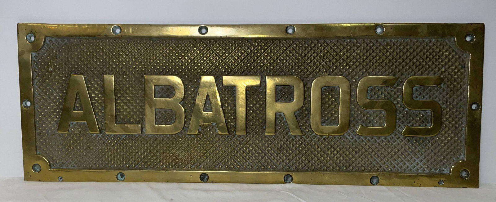 Royal Navy Ship’s Treadplate Albatross: Ship’s Treadplate from the Royal Navy vessel HMS Albatross, originally built as a seaplane carrier and launched in 1928 to support naval aviation operations between the wars. Designed to operate and