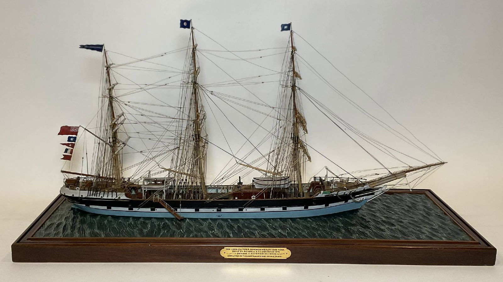 Finest Quality Model of the Iron Clipper Commonwealth: Exceptional model of the iron clipper Commonwealth. The ship was built by Russel and Co., Greenock, 1876, owner C.H. Stewart of London. Employed in the Australian and Indian trade. The model is highly