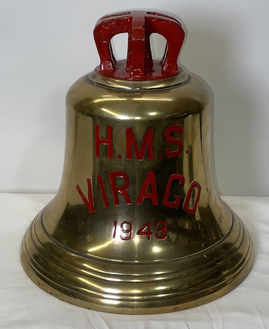 Bell from H.M.S. Virago (1943): Solid brass bell from the ship H.M.S. Virago, engraved “H.M.S. Virago 1943”. H.M.S. Virago was a V-class destroyer of the British Royal Navy, laid down in 1942, launched in 1943, and commissio