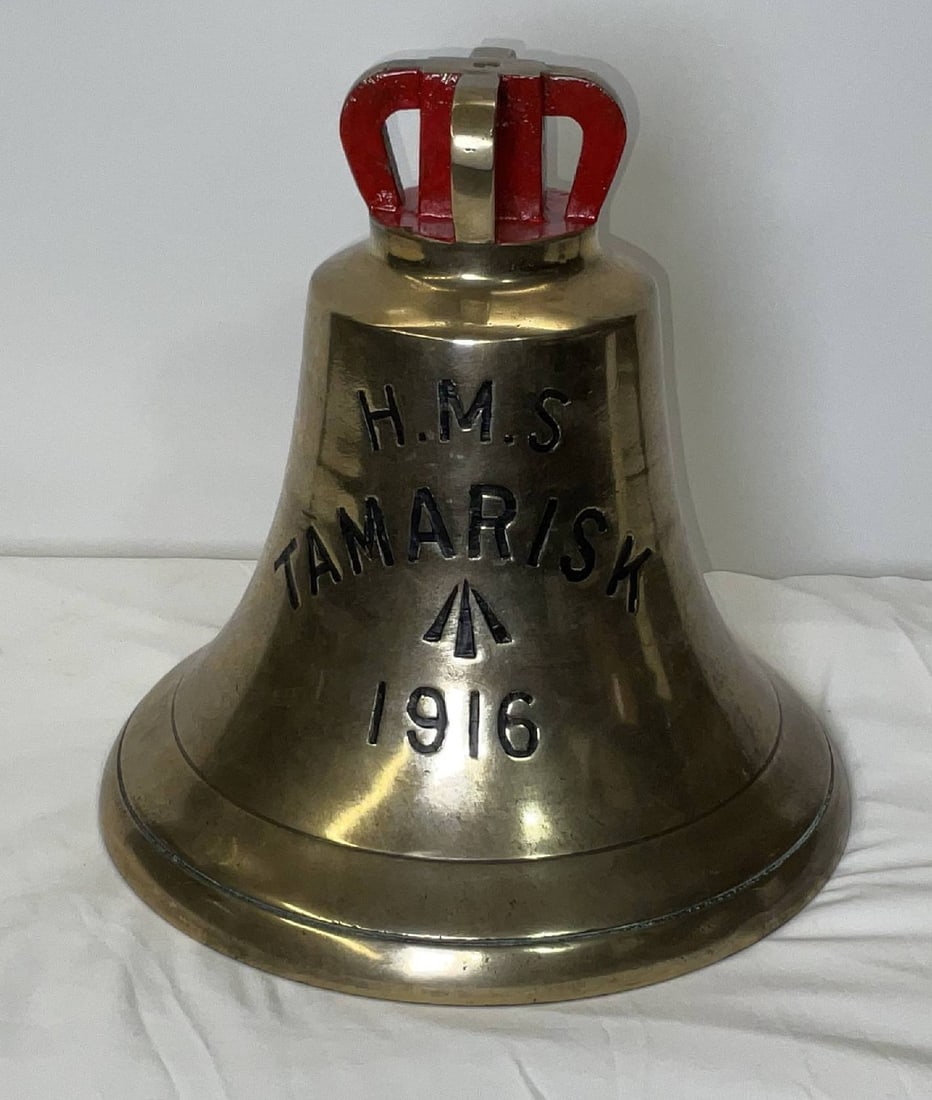 Bell from H.M.S. Tamarisk, 1916: Solid brass bell from the ship H.M.S. Tamarisk, engraved “H.M.S. TAMARISK 1916” fitted with a four canon crown mount cast into the bell. H.M.S. Tamarisk was an Acacia-class sloop of the Britis