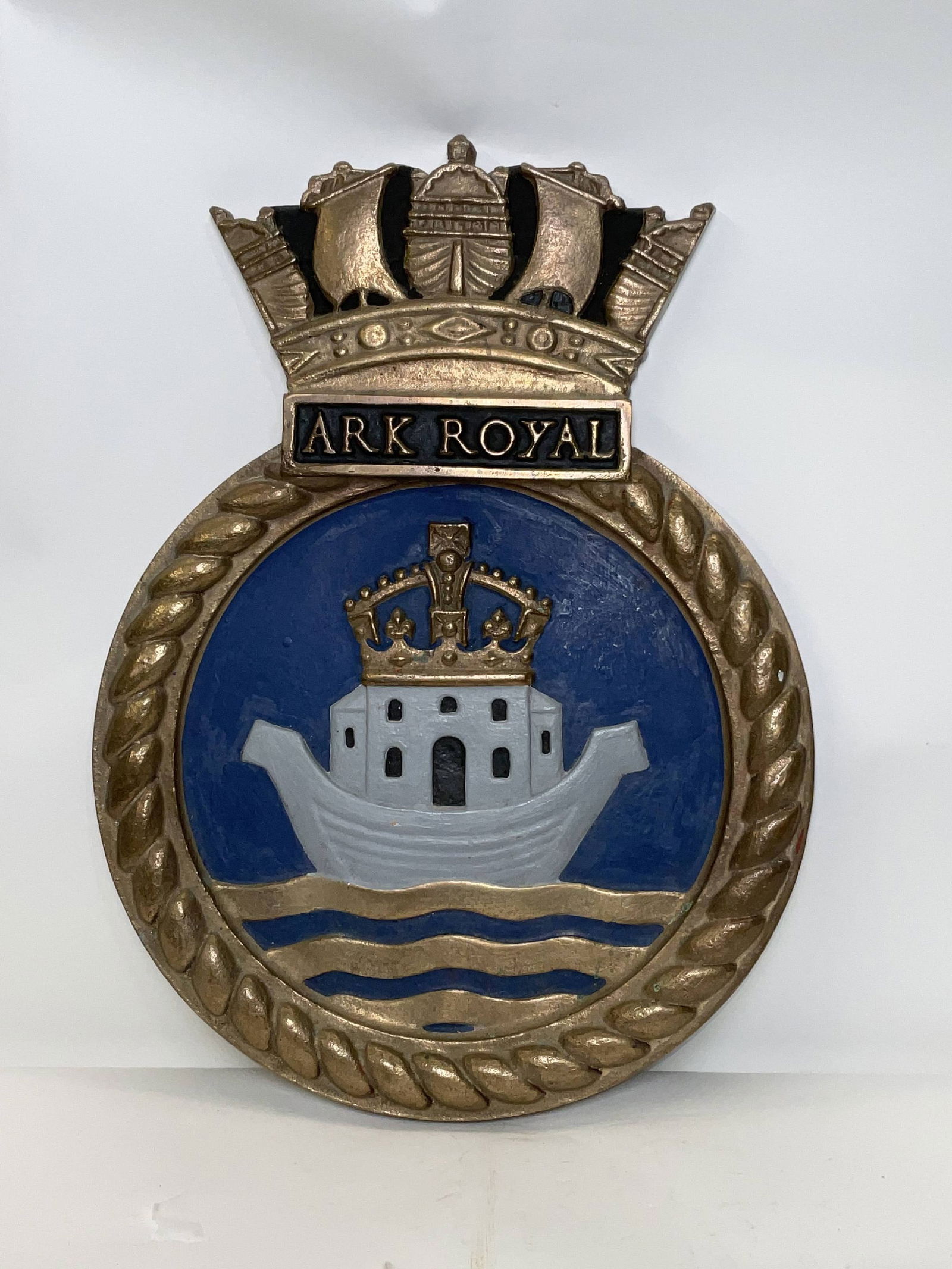 British Royal Navy Screen Badge from “HMS Ark Royal: Bronze screen badge from the British Royal Navy aircraft carrier Ark Royal. She played a crucial role early in World War II. She participated in numerous key operations, including hunting the