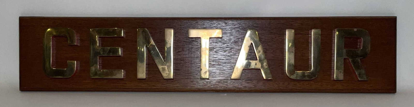 Royal Navy Ship’s Nameboard Centaur: Ship’s nameboard from the Royal Navy aircraft carrier HMS Centaur, the lead ship of the Centaur-class light fleet carriers, launched in 1947. Although completed too late to see action in the Second