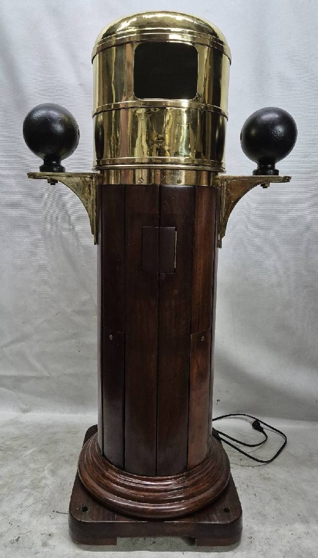Ship's Binnacle with Compass by Kelvin and Hughes: Ship's binnacle by English maker Kelvin Hughes. Fitted with a highly polished gimbaled compass. Varnished wood base with brass compensating ball brackets and iron balls.