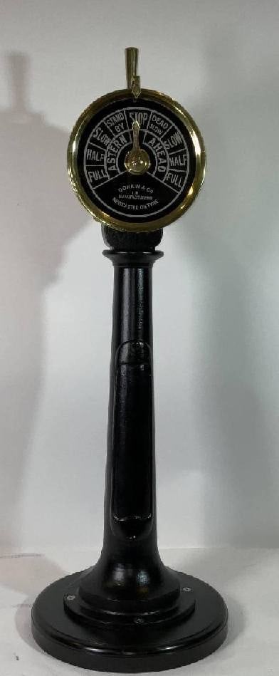 Ships Engine Order Telegraph: Ships bridge telegraph with highly polished brass head and painted iron base. Top of unit has brass plates from Donkin and Company, New Castle on the TYNE, rings well. Ships commands are displayed on