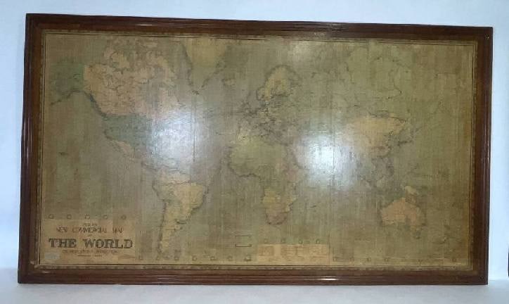 8 Foot Framed World Map by Philips: 1951 map of the world by George Philip and Son. Large beautiful map as it was in 1951. Nice patina mounted to a sturdy wood frame. Overall good condition. Very large in size. 90" W x 51" T.