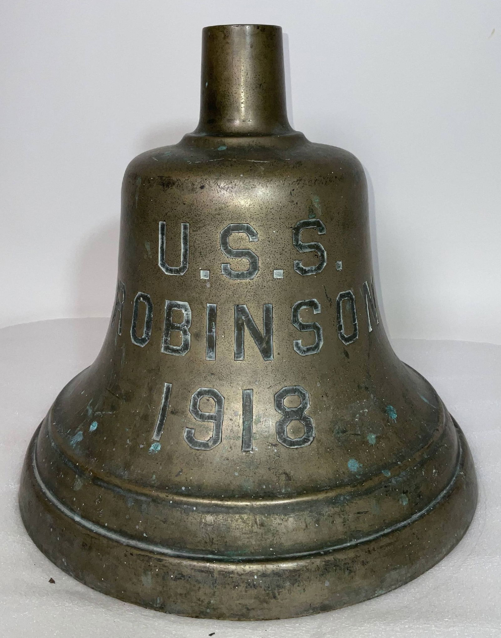 Ships Bell From HMS Newmarket EX USS ROBINSON: British Royal Navy ships bell from HMS Newmarket. HMS Newmarket was launched as USS Robinson in 1917, a Destroyer. She was transferred to the UK in 1940. Both sides of the bell are engraved
