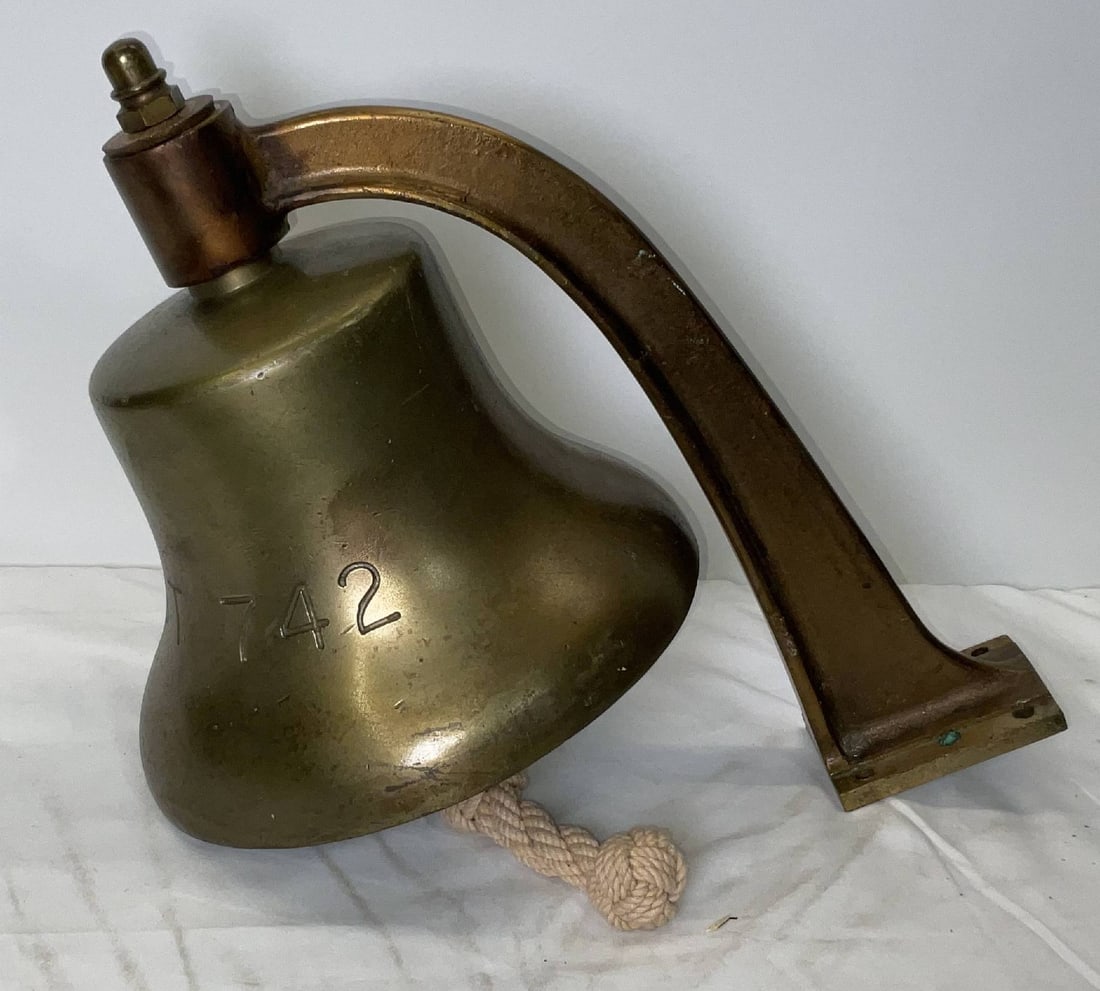 HMS Claverhouse Ship's Bell from the Edinburgh Shore Establishment: Solid brass bell from the ship U.S.S. LST-742, engraved “U.S.S. LST 742”. U.S.S. LST-742 was a Landing Ship, Tank (LST) of the United States Navy, constructed during the Second World War as