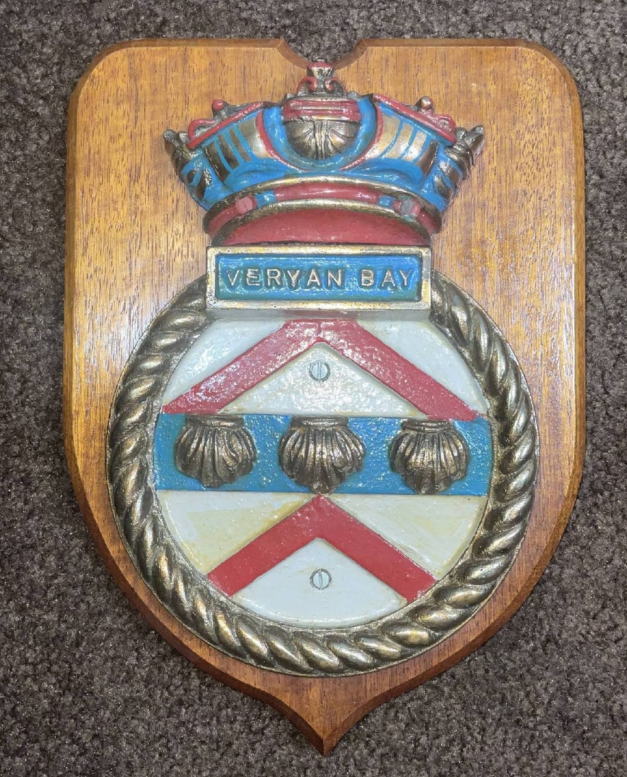 Royal Navy Ship's Plaque for HMS Veryan Bay: Painted Plaque for HMS Veryan Bay. Circular design with Naval crown top. Mounted to a wood backboard. 9 lbs. 12" H x 9" W.
