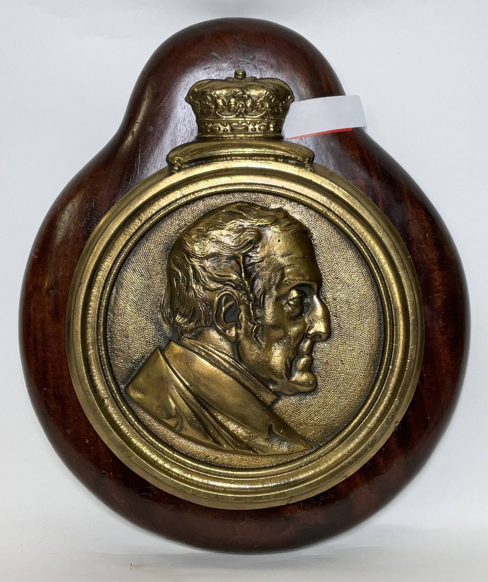 Gun Tompion from the Royal Navy Battleship HMS Iron Duke: Solid brass gun tompion from the famous dreadnought battleship HMS Iron Duke, named in honor of Arthur Wellesley, 1st Duke of Wellington. Mounted in a wood frame. HMS Iron Duke was 623 feet long, laun