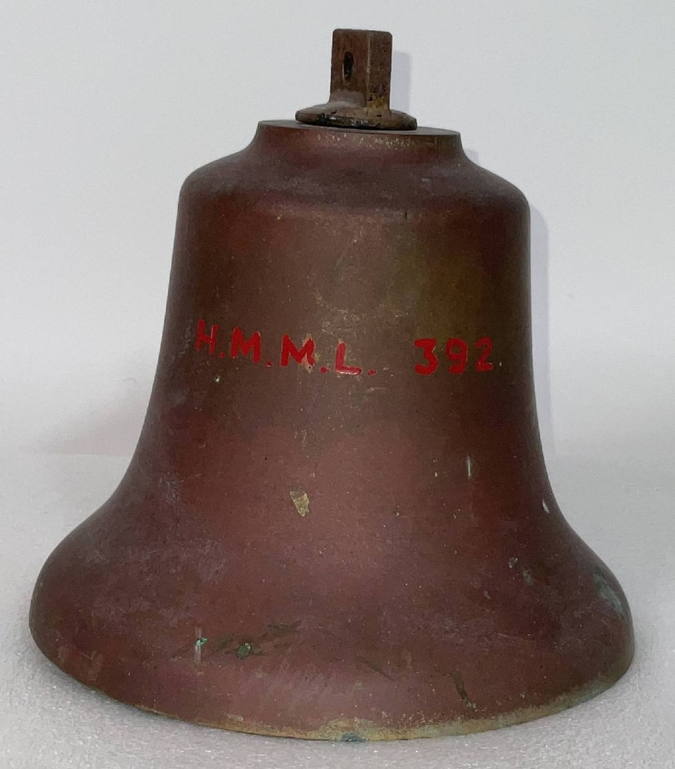 Bell from His Majesty's Motor Launch H.M.M.L. 392: Ship's bell from the Royal Navy Motor Launch H.M.M.L. 392. This ship’s bell is inscribed HMNL 392, a naval hull number designation rather than a vessel’s formal name. Bells such as this were