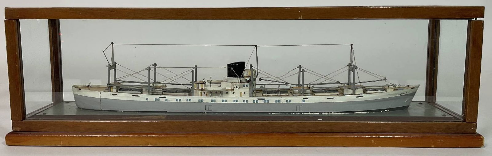 SS Wanstead: This is a lovely waterline model similar to the work of Charles Fox or Ron Hughes. It appears to be constructed mostly of wood, brass, and cardstock, and sits on a convincing and well rendered sea