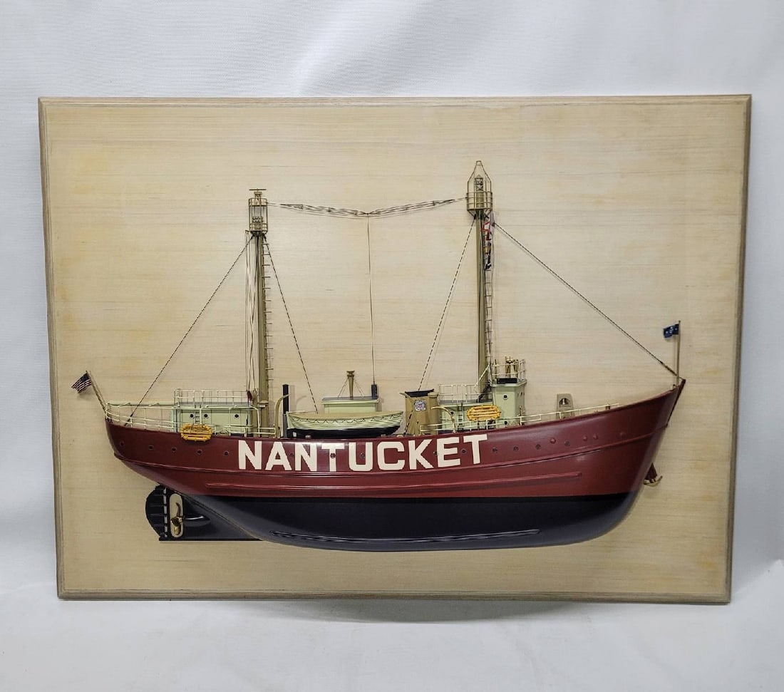 Half Model of the Lightship Nantucket: Museum quality half model of the Lightship Nantucket. This fine model has a carved hull, countless milled brass fittings, built up cabins, etc. Details include masts with signal flags, railings,