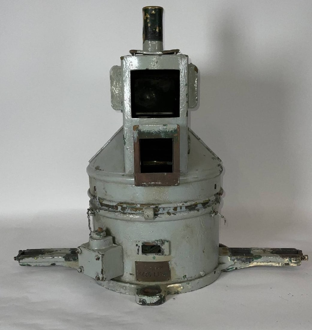Tell-Tale Binnacle Housing: Solid brass tell-tale ship's binnacle housing without compass. Meant to be mounted from overhead on a ship. It is fitted with mirrors and prisms. 20"H x 24"W x 12"D.
