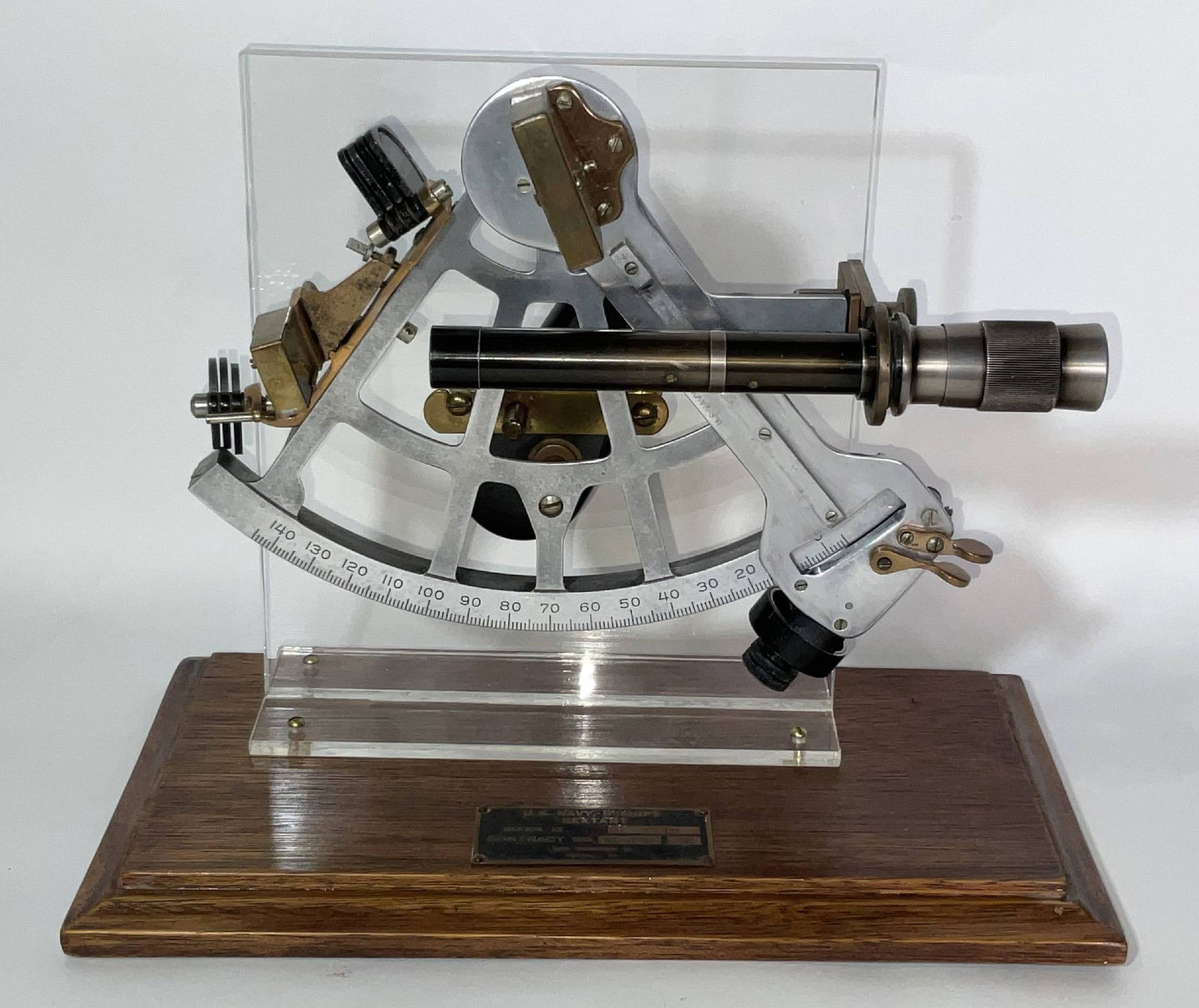 US Navy Bureau of Ships Mark II Sextant in Case: Aluminum framed with brass components Mark II navigator's sextant in a custom lucite display case. Original box also included. Made for the U.S. Navy Bureau of Ships. 9 lbs. 7"H x 12"W x 13"D.