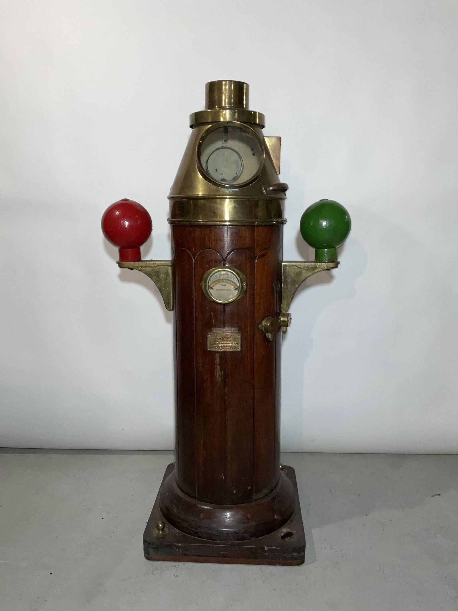 Classic Ship's Binnacle by Sestrel Henry Brown Co: Ship's compass by "Sestrel", Henry Brown and Son, mahogany base with brass fittings, clinometer, name badge, etc. The brass binnacle housing carries a gimbaled compass also by Sestrel. 60"H. 24"H x