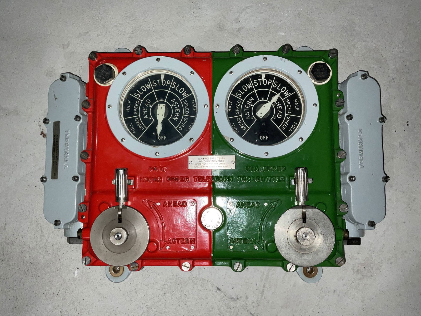 Port and Starboard Ship's Engine Order Telegraph: From a British Minesweeper, this Evershed and Vignoles ship's engine room telegraph unit. Two-face design with painted red and green sections for port and starboard. Ahead and astern commands are