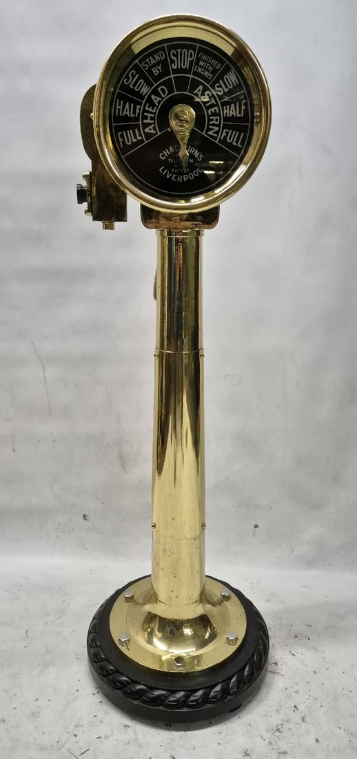 Original Ship's Telegraph by Chadburns of Liverpool: Ship's engine order telegraph, engine room unit showing ahead and astern commands with brass arrow. Single-face design. Meticulously polished and lacquered. 43 1/2''H x 15''W x 15''D. 53 lbs.