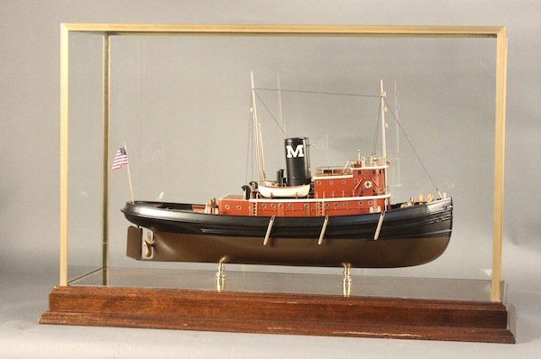 Ship Model New York Harbor Tug Boat: Display model o the New York Harbor Tug Boat, Edmond Moran. Tug model is complete with many brass fittings and details including lifeboats, spot light, binnacle, winch, wheel, bumpers, ladder, stacks